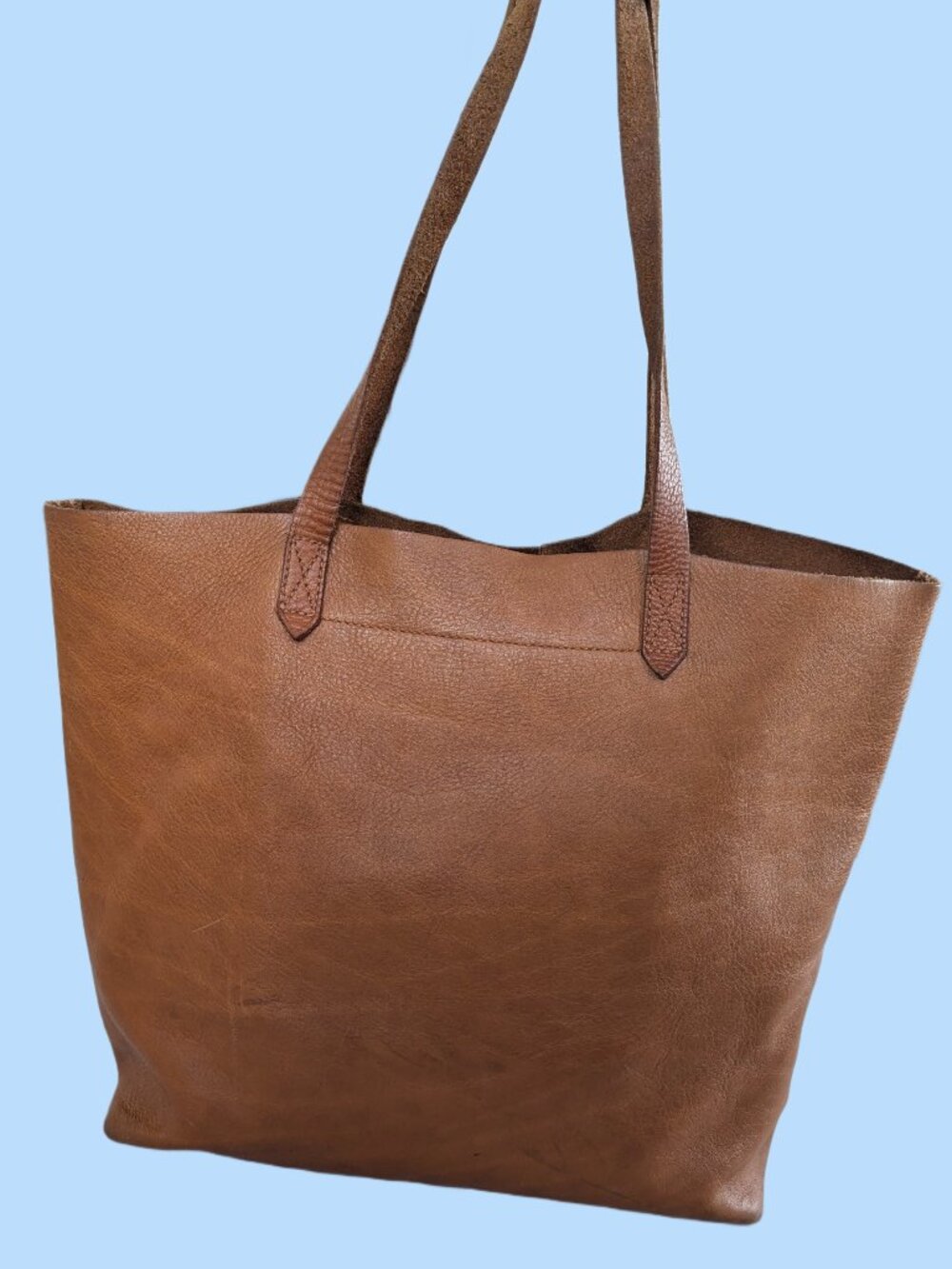 The Transport Tote from Madewell, in signature English Saddle brown leather